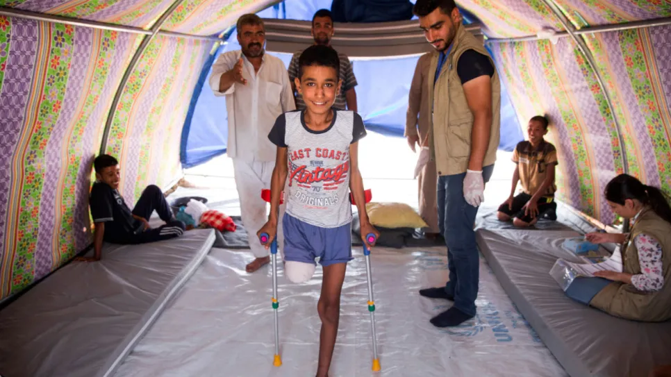 hero_c_William-Daniels_HI__Abdel_Rahman__12__stands_tall_thanks_to_HI's_rehabilitation_team_in_Iraq.jpeg