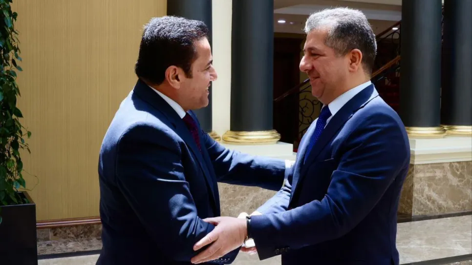 قاسم الأعرجي ومسرور بارزاني.jpg
