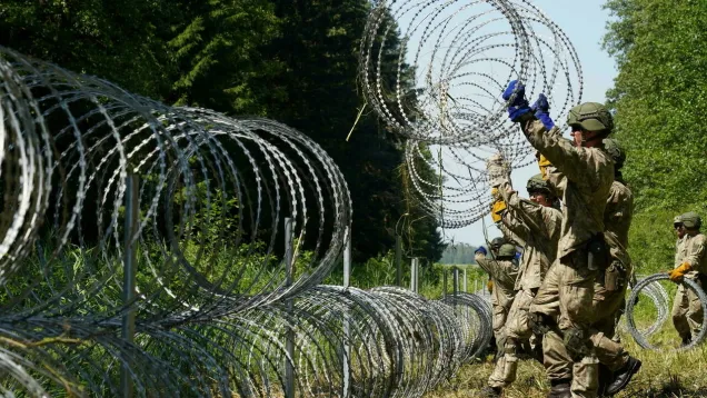 2021-08-05T160838Z_142390707_RC24ZO96I1JQ_RTRMADP_3_BELARUS-POLITICS-POLAND-MIGRANTS.jpeg