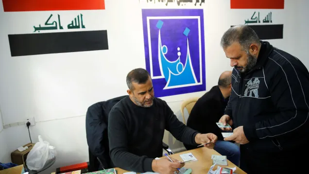 2021-01-20T130731Z_1307815088_RC2PBL9ORIJ5_RTRMADP_3_IRAQ-ELECTIONS-VOTERS-ID.jpeg