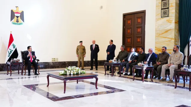 أبو فدك والسوداني.jpg