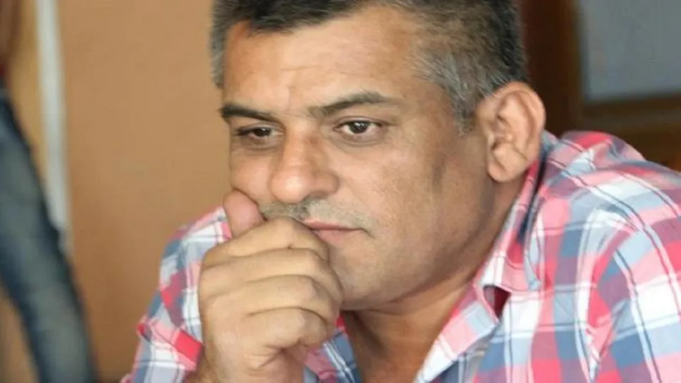 الاخرس.jpg