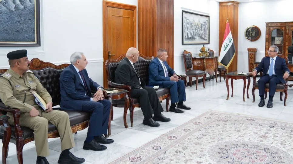 فائق زيدان ووزير الداخلية.jpg