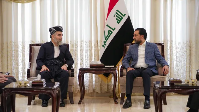 الحلبوسي وجماعة العدل.jpg